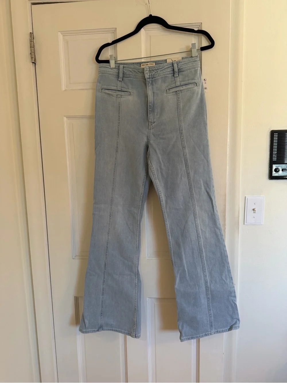 Free People High-Rise Light Wash Jeans with Pink Star Patches